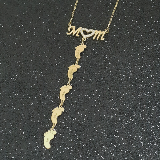 Zirconia Inlay Mom Necklace With Feet on a black background