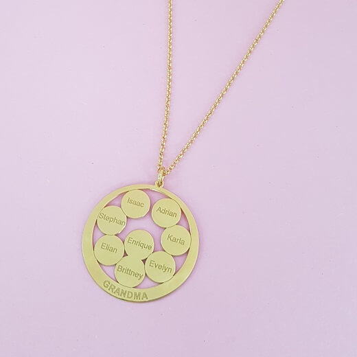 Circle Discs Engraved Grandma Necklace on pink background