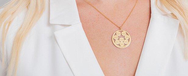 Engraved necklace on a Solo Mio Jewelry model